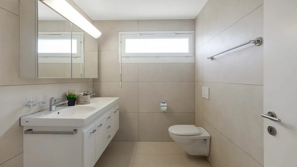 Appartamento giardino confortevole di 4,5 locali con due aree esterne – foto 11 di 13