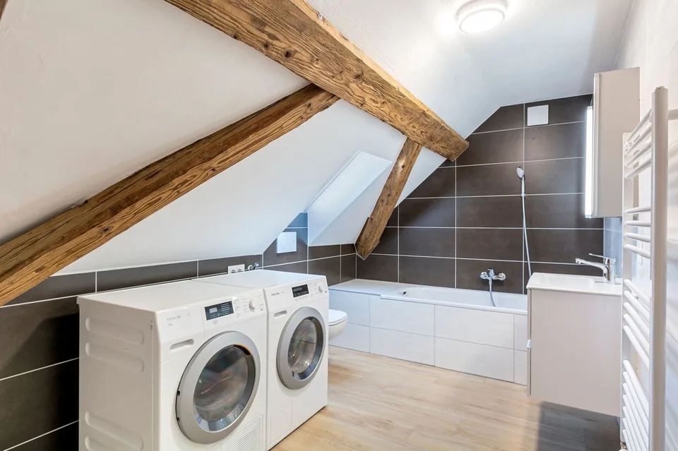 New, furnished duplex apartment — 5.5 rooms (3 bedrooms + gallery) — approx. 128 m² + loggia — Courfaivre