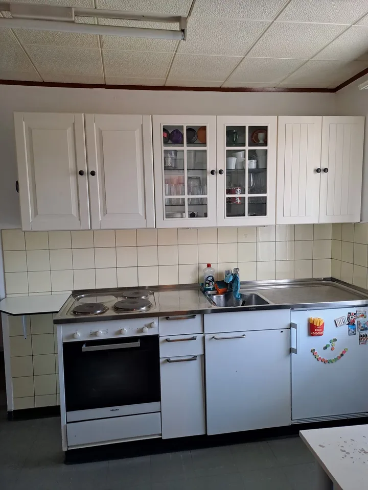 Appartement de 2,5 pièces dans un immeuble ancien avec balcon