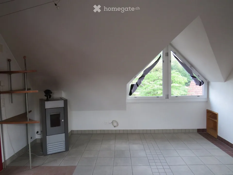 Appartement mansardé confortable avec entrée privée