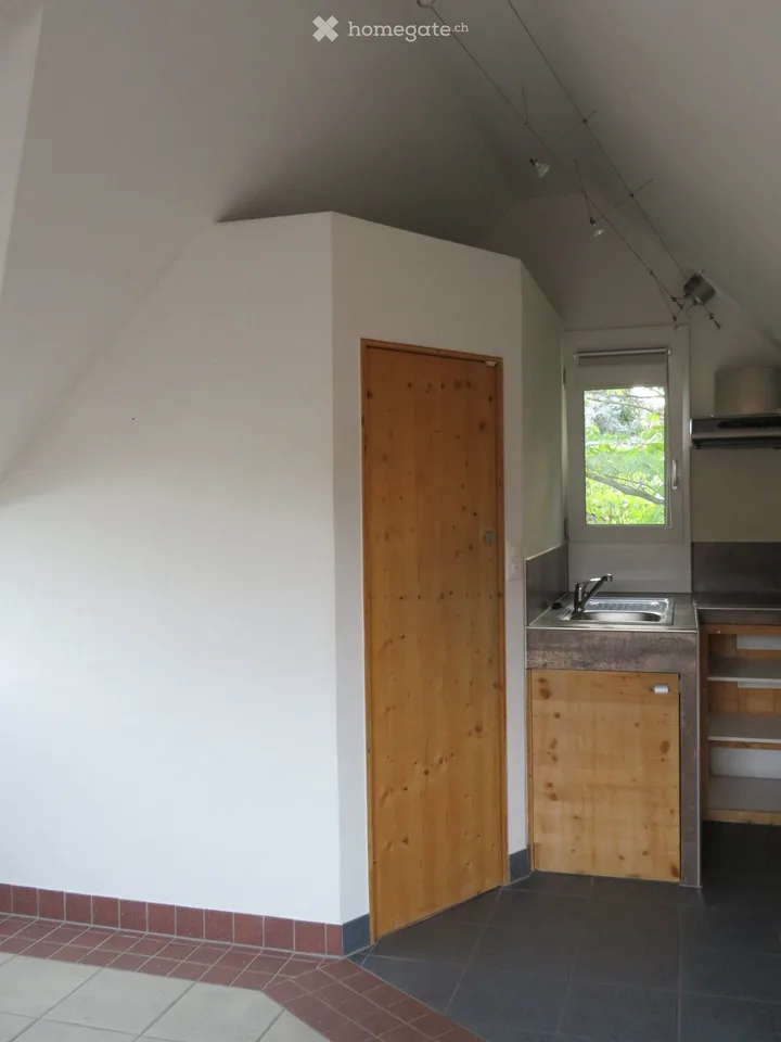 Appartement mansardé confortable avec entrée privée