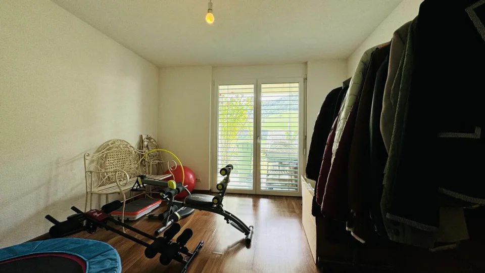 Bella casa a schiera 5.5 locali con giardino, area di seduta, balcone e 2 posti auto