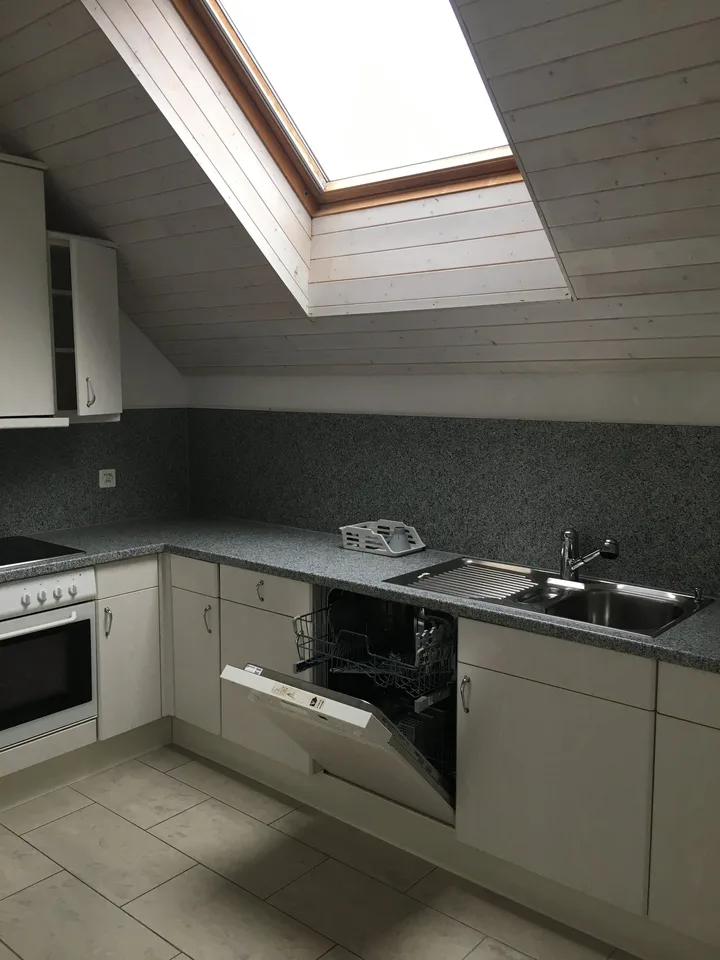 Appartamento mansardato luminoso 3.5 locali con balcone sud & molto charme