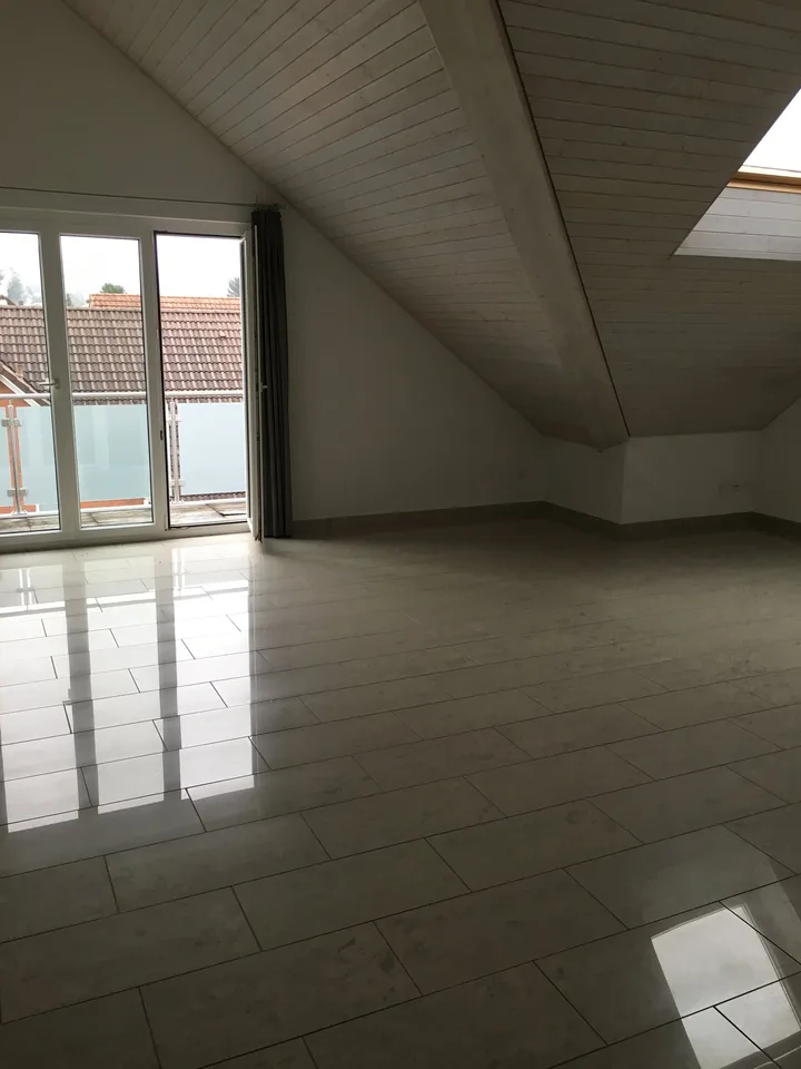 Appartamento mansardato luminoso 3.5 locali con balcone sud & molto charme