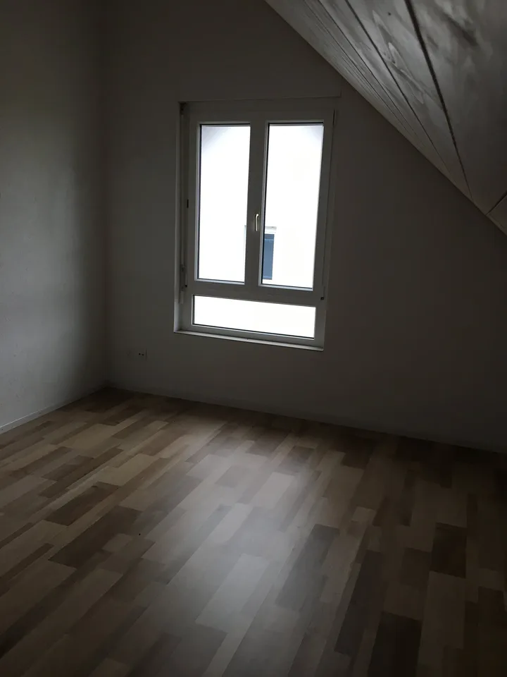 Appartamento mansardato luminoso 3.5 locali con balcone sud & molto charme