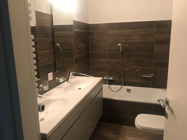 Attico con stupenda vista lago in casa di soli 3 appartamenti