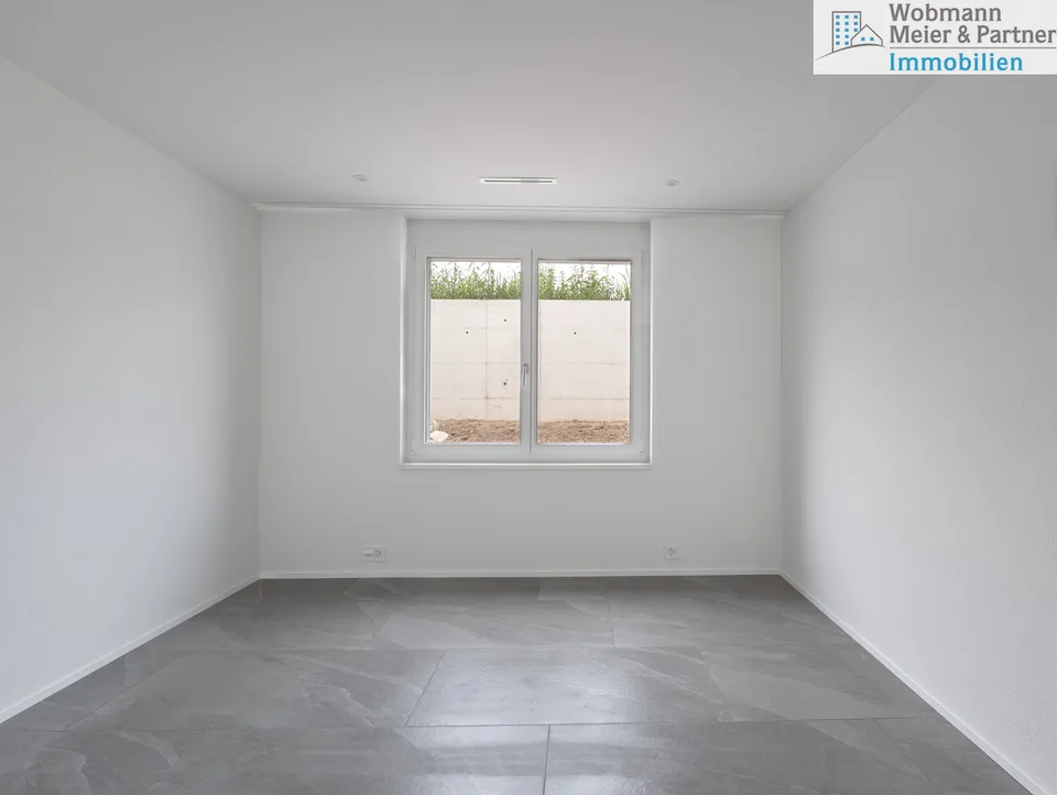Appartement neuf de 4,5 pièces de haute qualité avec jardin d'hiver au rez-de-chaussée