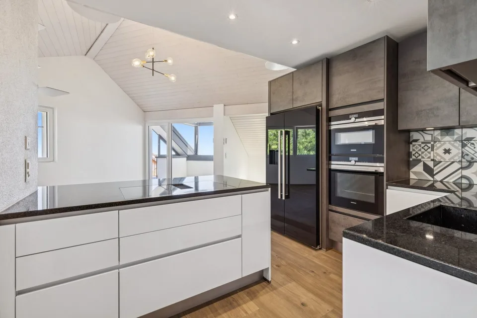 Élégant appartement avec mezzanine et panorama exceptionnel sur le lac – photo 4 sur 13