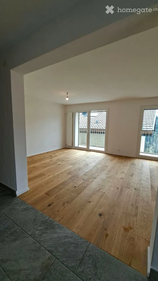 Appartement rénové 1 étage 2 places de parc
