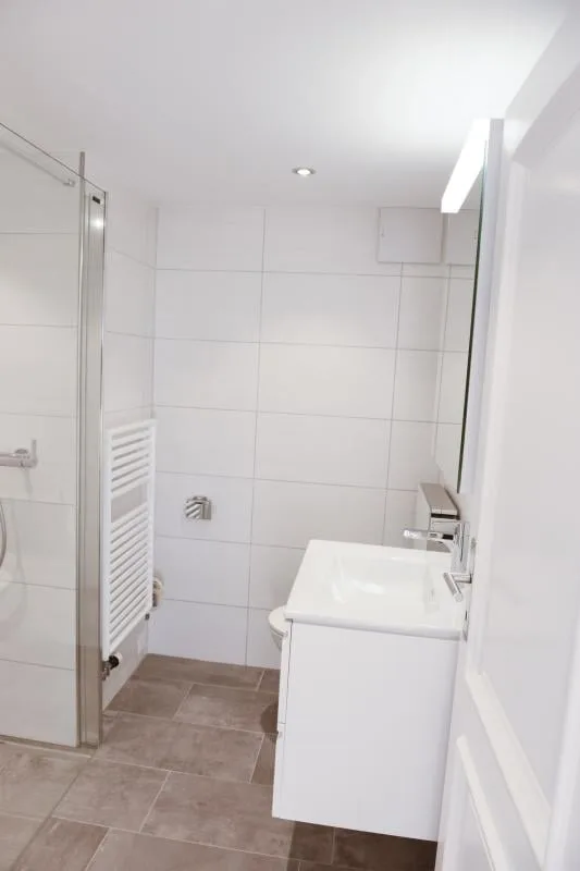 Appartement moderne, proche du centre avec vue lointaine – photo 10 sur 11