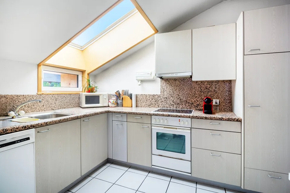 Appartement au dernier étage en centre-ville – photo 4 sur 9