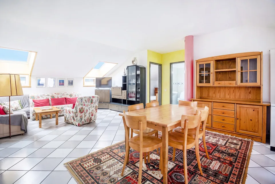 Appartement au dernier étage en centre-ville – photo 3 sur 9
