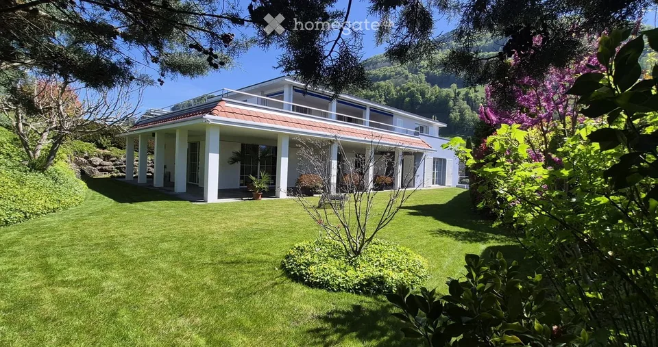Traumhaftes 6.5-Zimmer-Einfamilienhaus mit Seeblick in Greppen – Foto 4 von 22