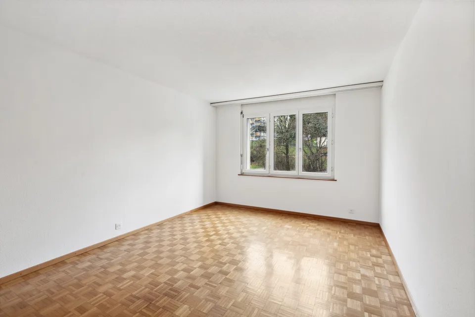 Appartement 3 pièces lumineux avec balcon et vue à La Chaux-de-Fonds – photo 9 sur 12