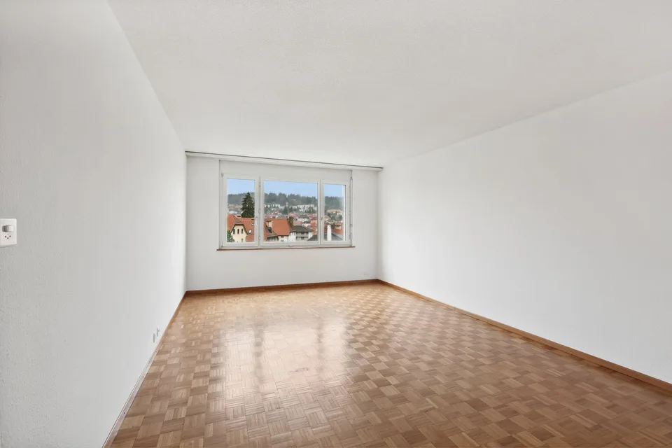 Appartement 3 pièces lumineux avec balcon et vue à La Chaux-de-Fonds – photo 6 sur 12