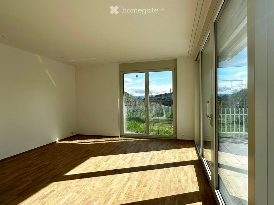 Appartamento-mansarda esclusivo da 4,5 a 5 locali in una casa di 2 famiglie con vista unica sul lago e le montagne