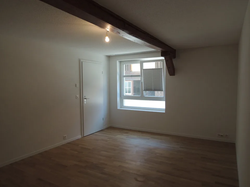 Charming 2.5-room ground floor apartment