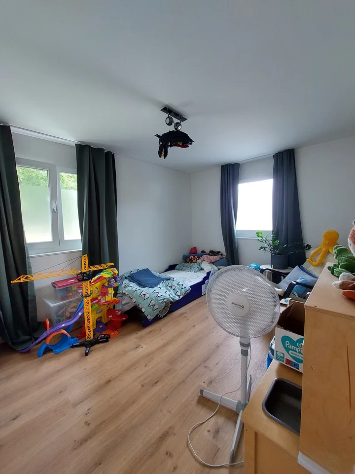 Appartement charmant avec beaucoup d'espaces verts, moderne et familial