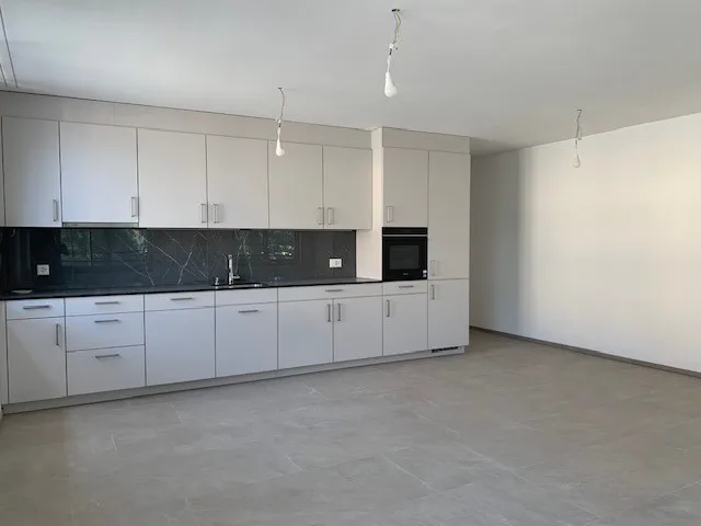 Newly built 3.5-room apartment directly at the train station