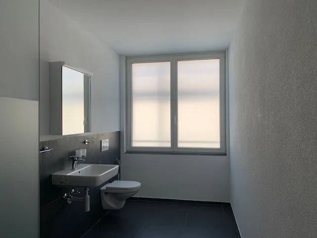 Newly built 3.5-room apartment directly at the train station