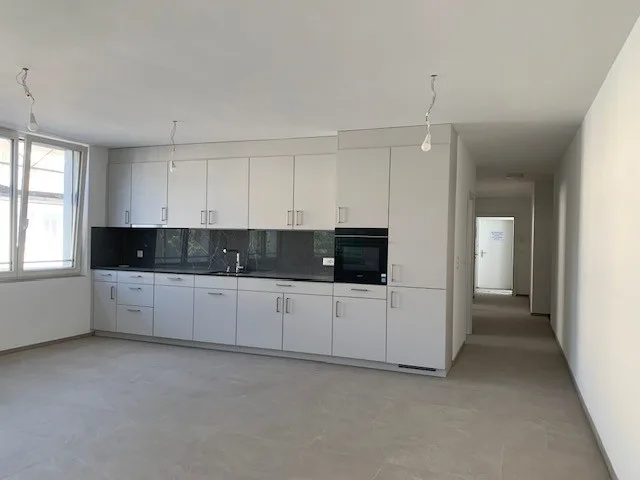 Newly built 3.5-room apartment directly at the train station