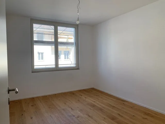 Newly built 3.5-room apartment directly at the train station