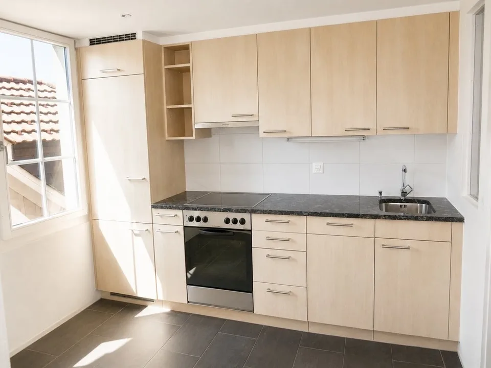 4.0-Zimmer-Dachwohnung mit Charme und eigenem Sitzplatz
