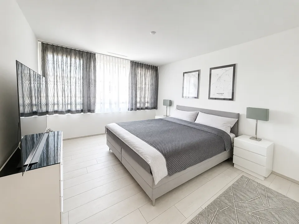 Appartamento 3.5 locali di alta qualità con vista sul lago – vivere con stile e una vista lontana