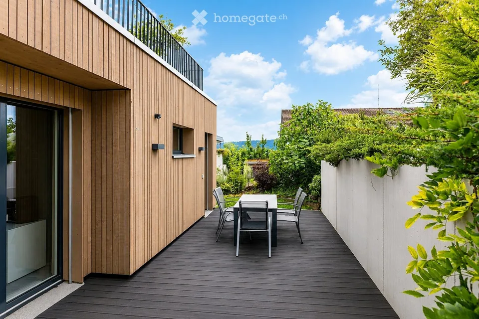 Appartement 2.5 pièces avec une atmosphère de maison et terrasse privée