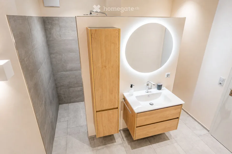 Appartement 2.5 pièces avec une atmosphère de maison et terrasse privée