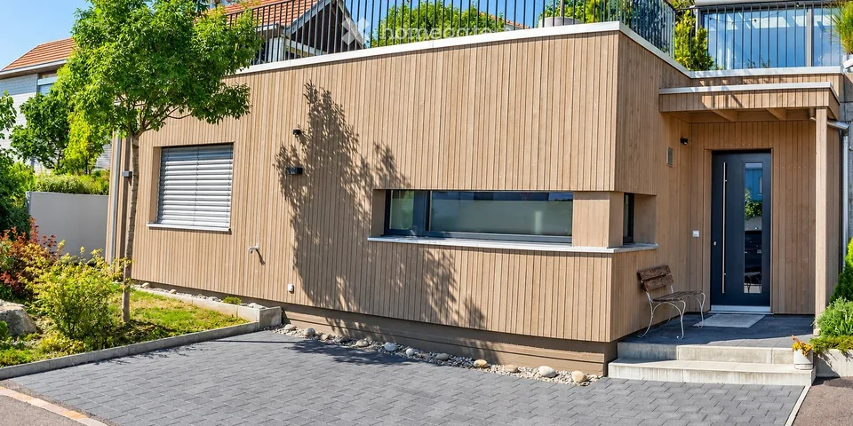 Appartement 2.5 pièces avec une atmosphère de maison et terrasse privée