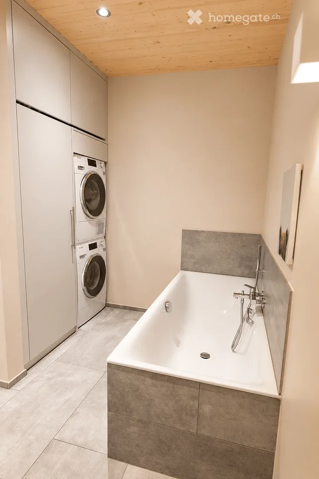 Appartement 2.5 pièces avec une atmosphère de maison et terrasse privée