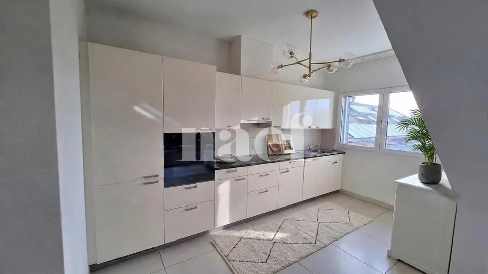 In the center of Founex - beautiful 3-room apartment of approx. 82m2 in the attic