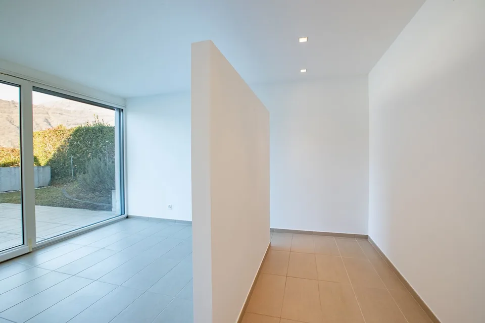 Oase der Exklusivität, 10 Minuten vom Zentrum von Lugano: Modernes 3.5-Zimmer-Wohnung mit großem Garten – Foto 19 von 26