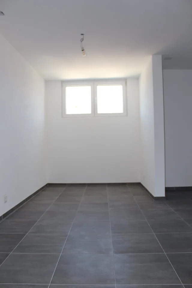 Bright 4.5-room apartment with balcony in Courfaivre