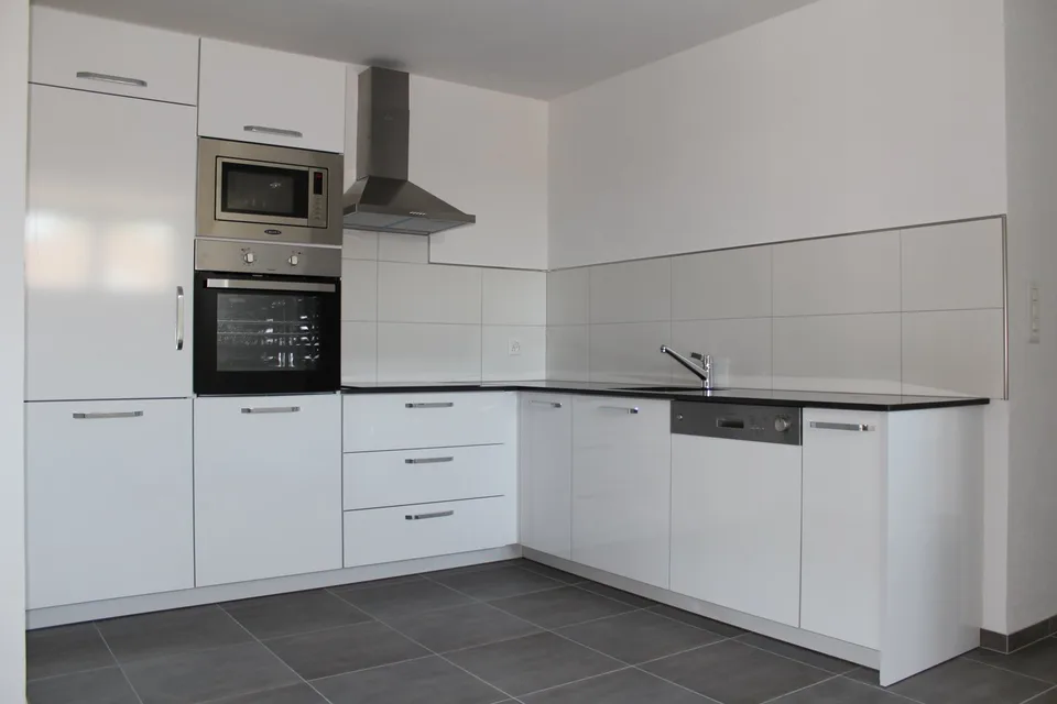 Bright 4.5-room apartment with balcony in Courfaivre