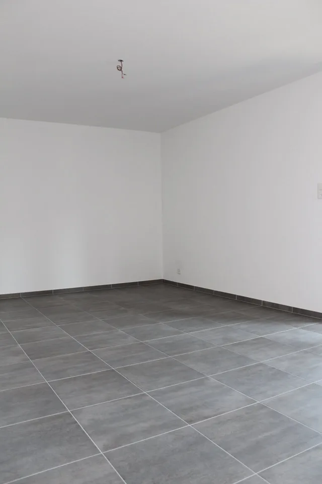 Bright 4.5-room apartment with balcony in Courfaivre