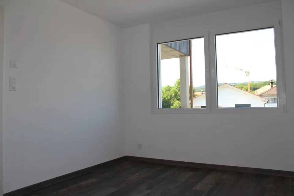 Bright 4.5-room apartment with balcony in Courfaivre