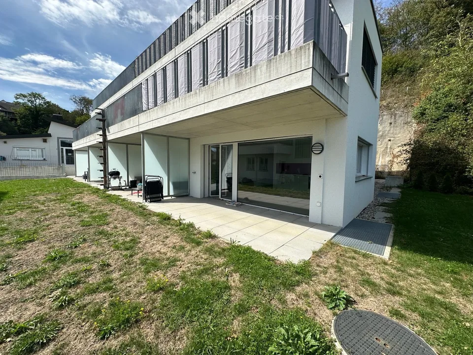 Appartamento moderno 2.5 locali con area giardino