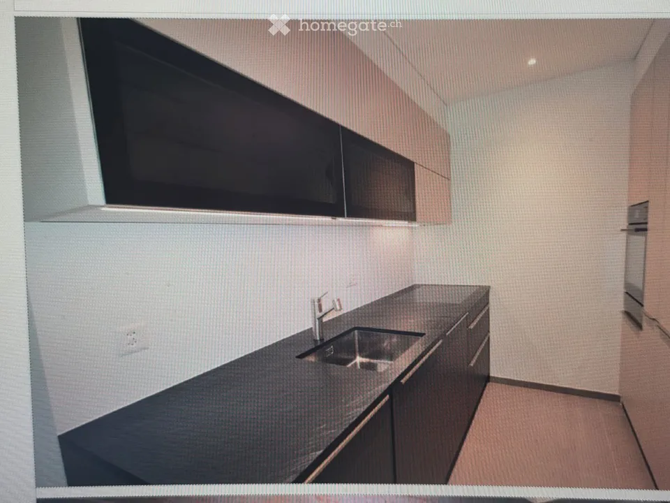Appartamento moderno 2.5 locali con balcone e vista splendida a Caslano