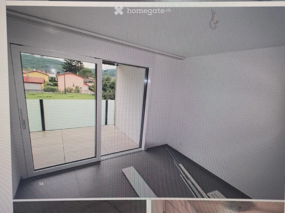Appartamento moderno 2.5 locali con balcone e vista splendida a Caslano