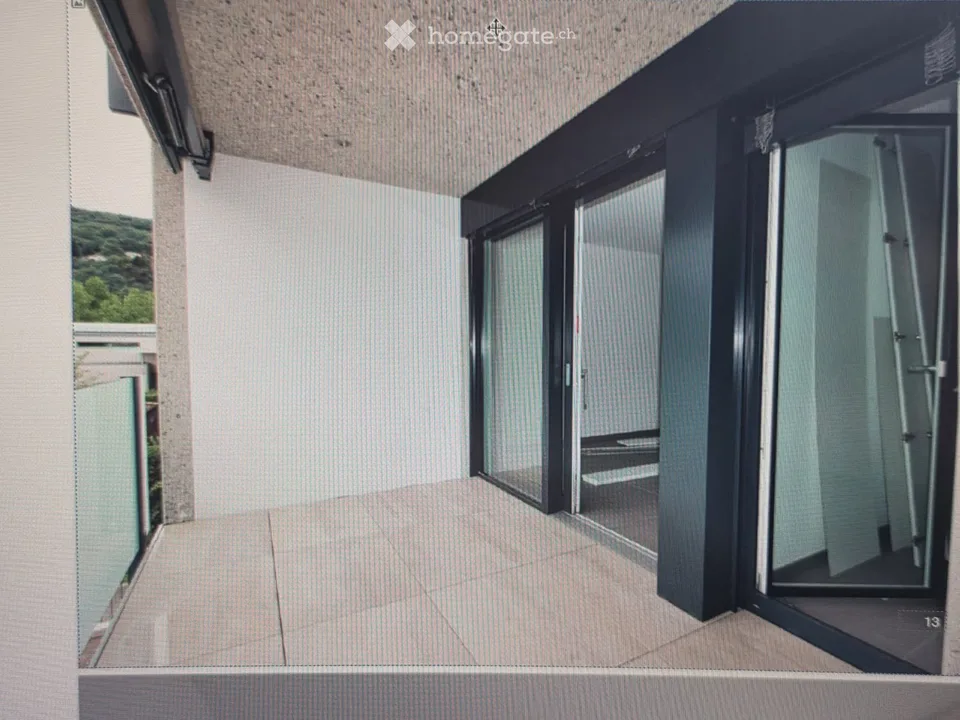 Appartamento moderno 2.5 locali con balcone e vista splendida a Caslano
