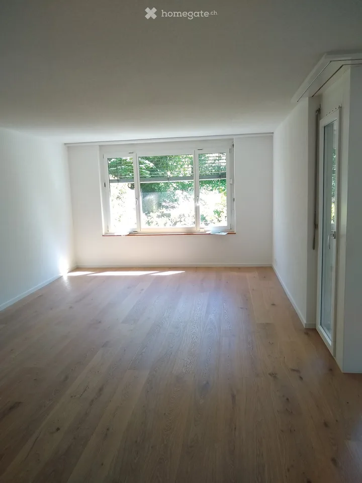 Maison de rang rénovée récemment avec jardin dans un quartier familial