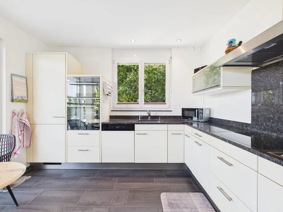 Well-maintained single-family house with plenty of space and maximum privacy – photo 7 of 13