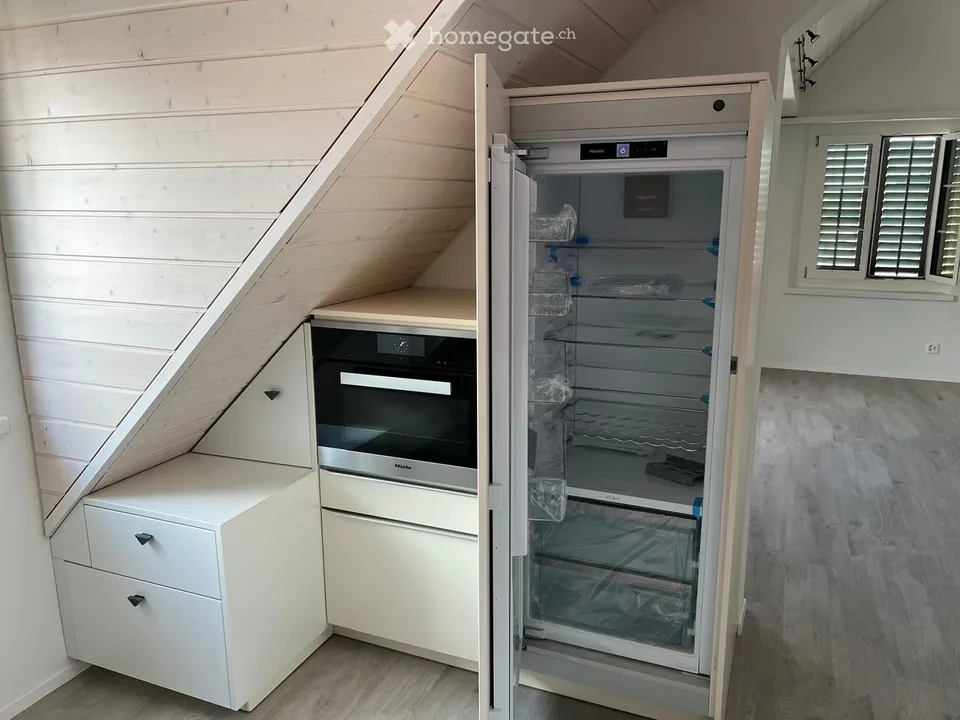 Modern 3.5-room attic apartment on Bahnhofstrasse in Dielsdorf