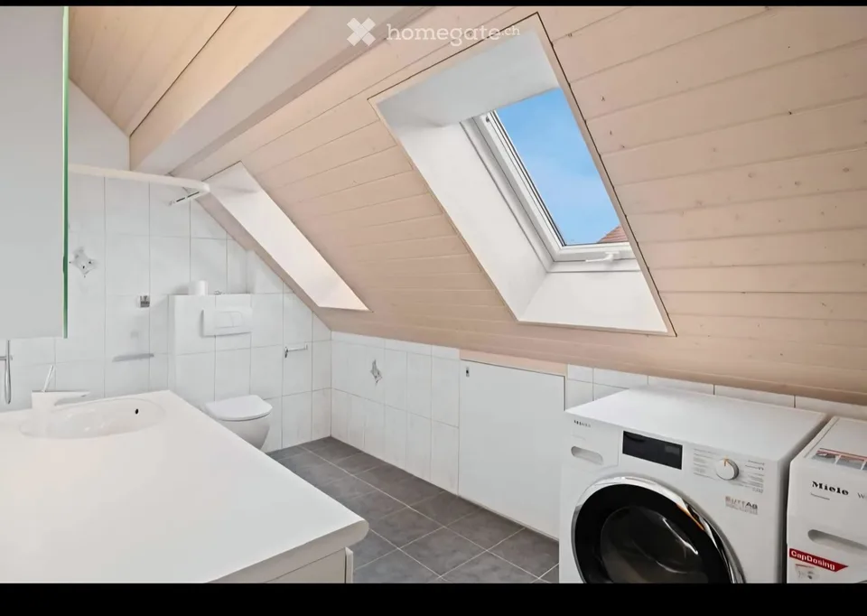 Modern 3.5-room attic apartment on Bahnhofstrasse in Dielsdorf