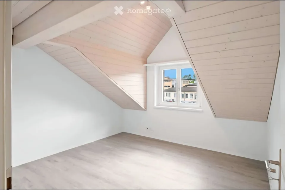 Modern 3.5-room attic apartment on Bahnhofstrasse in Dielsdorf