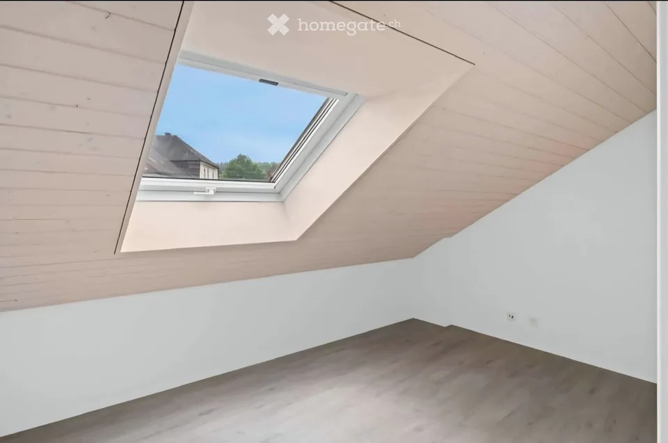 Modern 3.5-room attic apartment on Bahnhofstrasse in Dielsdorf
