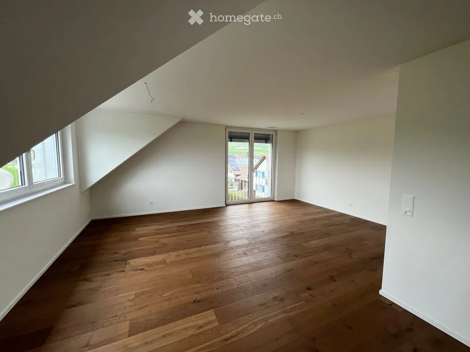 Appartamento moderno & intelligente di 3,5 locali con balcone, cantina & parcheggio sotterraneo a Oberhallau