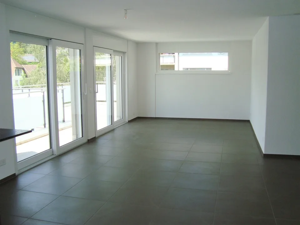 Moderne Attikawohnung mit sonniger Terrasse und Blick ins Grüne